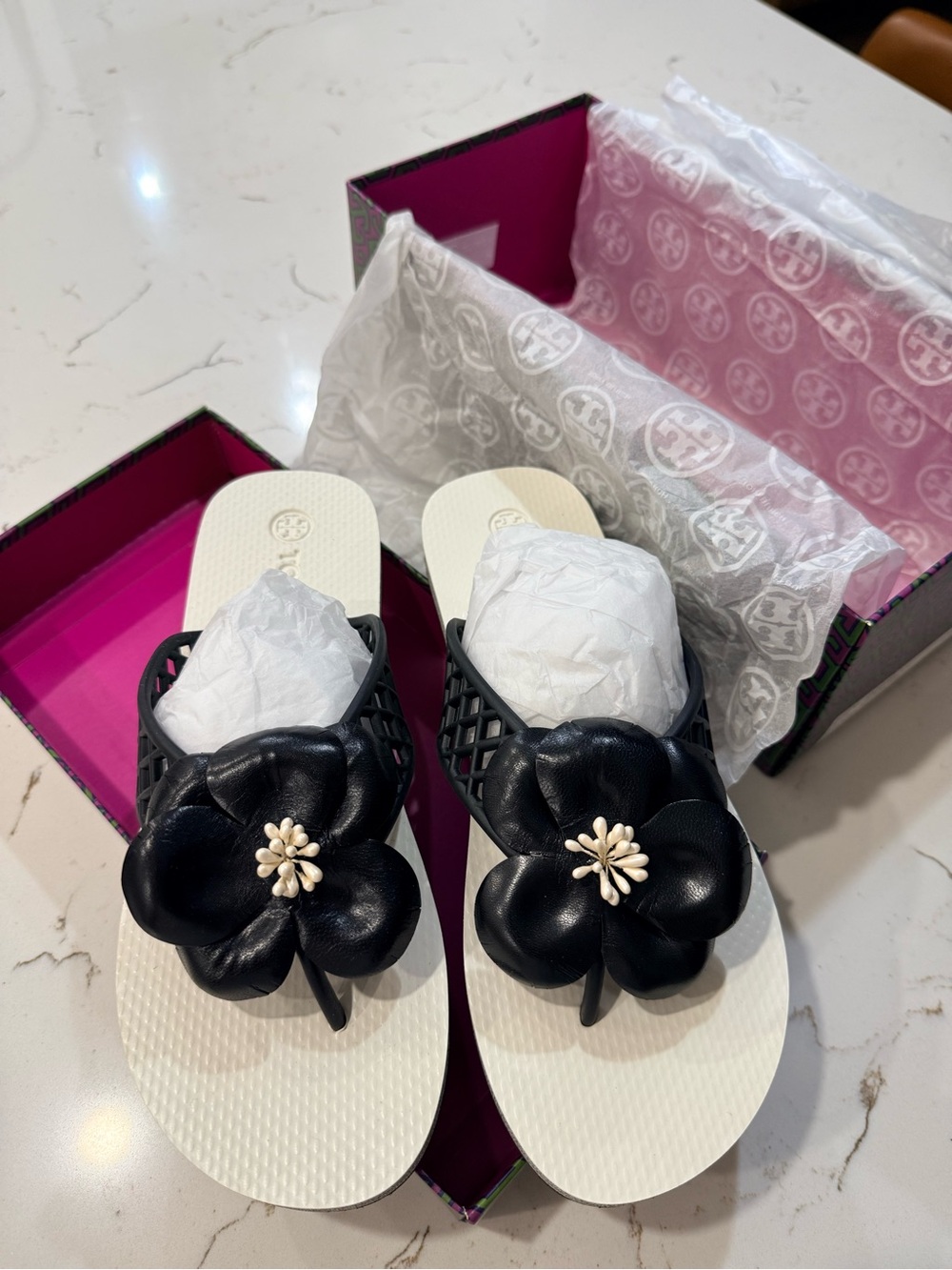 Tory Burch Black Floral Appliqué Flip Flop Sandals on White Sole